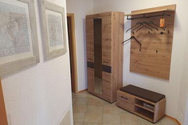 Ferienwohnung "SonnenZeit" - Ferienwohnung mit großer Südwest-Terrasse & unbegrenztem Osserbad-Zugang