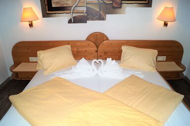 Sieglhub Chalets * Appartements * Hotel - A 3-Blumen Familienzimmer Tennboden