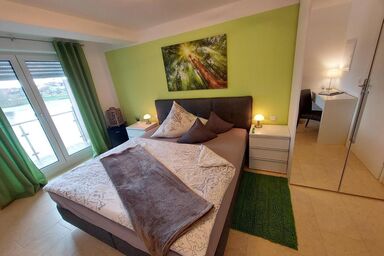 Ferienwohnung und Zimmer zum Donaublick - Ferienzimmer 1 mit Blick auf die Donau