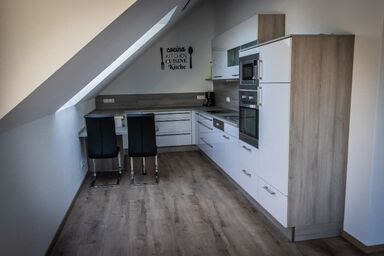 Landhaus Stadlhof - Moderne Ferienwohnung 6 mit Garten und Wellness-Bereich