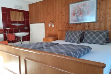 Apart Alpenland Maurer - Doppelzimmer mit Zustellbett