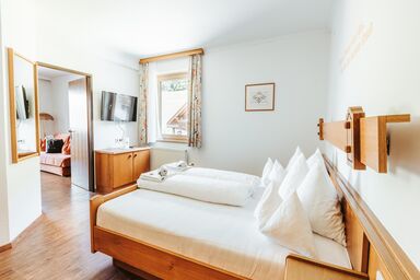 Regitnig - 4* Hotel & Chalets - Juniorsuite 43 m² 3/4 GP 4-6N