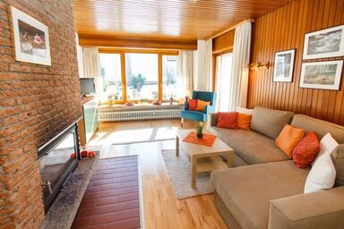 Am Traunufer Klaus Plenk inkl. Chiemgaukarte - Ferienwohnung 1 EG 58qm, Terrasse, Küche, 1 Schlafzimmer, 1 Wohnschlafzimmer