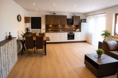 Rottaler Ferienhaus - Rottaler Oachkatzl - Ferienwohnung Waldlichtung mit direktem Gartenzugang