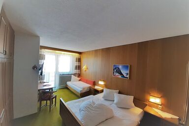 Haus am Brunnen - Doppelzimmer mit Zusatzbett