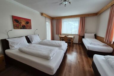 Gästehaus Zum Steirischen Kuss - Vierbettzimmer mit Dusche, WC