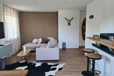 Ferienwohnung Messinger - Ferienwohnung 80 qm 1 sep. Schlafzimmer für 1-4 Personen mit Balkon