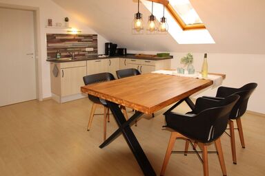 Ferienhaus "Kleine Auszeit" Parkstraße - Ferienwohnung 2 mit sonnigem Balkon