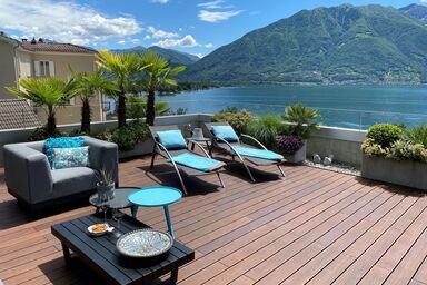 Exklusive Wohnung mit grosser Terrasse mit Seeblick, Liegewiese mit Kunstrasen
