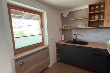 Chalet Lilly inkl. Chiemgaukarte - Chalet Lilly, Terrasse mit Garten, 3 Schlafzi., 1 Wohnzi., Kamin, Bad/WC, max. 6 Pers.