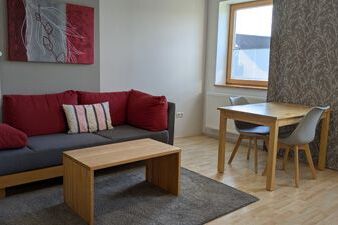 Weinbau Ferienwohnungen Familie Neubert - Ferienwohnung Weide (50 m²) mit großem Südost-Balkon