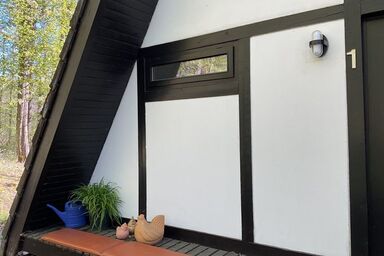 Feriendorf Sulzfeld - Ferienhaus Huhn mit Terrasse