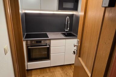 Ferienwohnung Klein - Ferienwohnung für 1-2 Personen, offener Wohn- Schlafbereich mit Küchenzeile, Bad mit Badewanne und Dusche