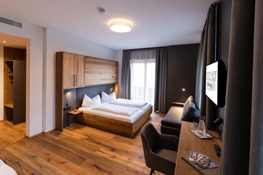 Familiengut Ertlhof - Stil Mehrbettzimmer mit Balkon