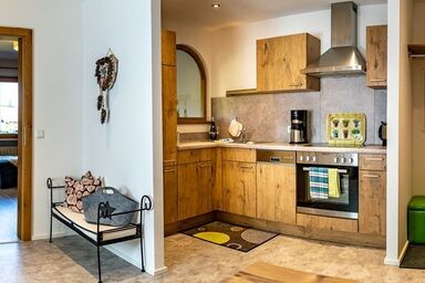 Gästehäuser Schwemmbauer - Zwei-Raum-Wohnung (6) Haus Resi, Wohnküche, Du/WC mit Wärmekabine, Balkon (60m²)