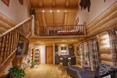 Holzhaus Lugerhof - Ferienwohnung Holzwurzel
