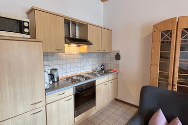 Café Chiemgau und Gästehaus - Ferienwohnung 9 Unternberg 46qm, Balkon, 1 Schlafzimmer, Wohnschlafzimmer, WLAN