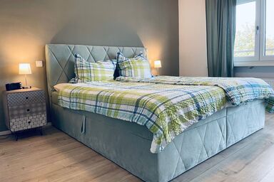 Das Bootshaus - Ferienwohnung Seeblick, 60 qm, 1 sep. Schlafzimmer mit Balkon