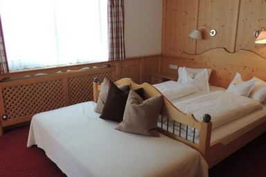 Muggengrat, Pension - Doppelzimmer mit Zusatzbett