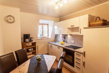 Ökonomiehof - Ferienwohnung Mühle mit gemütlicher Essecke