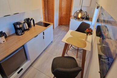 Ferienwohnung Alpenglück - Ferienwohnung Alpenglück 25qm mit Terrasse für max. 2 Personen