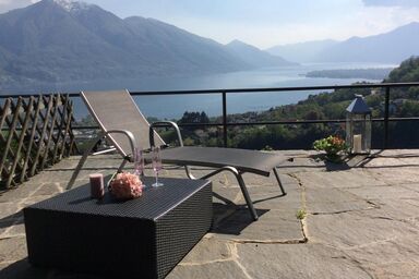 Sympathisches Ferienhaus mit grosser Terrasse, Panoramablick und Ganztagssonne