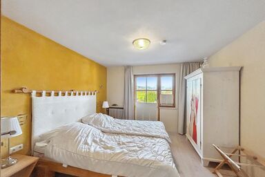 Haus Farbenklang - Wohnung mit Garten & Terrasse – naturnah & ruhig, kostenlose Sauna & Wellness