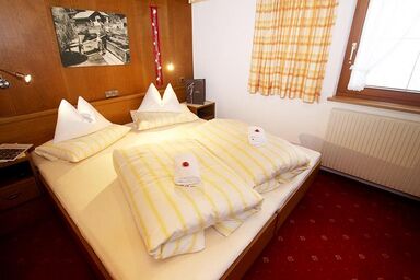 Haus Alpenglühn - Dreibettzimmer